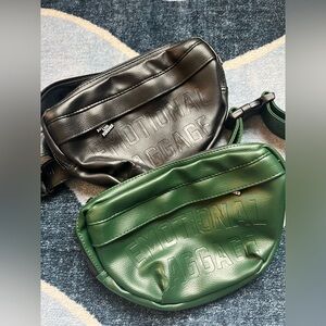NWOT Set of 2 “Emotional Baggage” Assholes Live Forever faux leather fanny packs